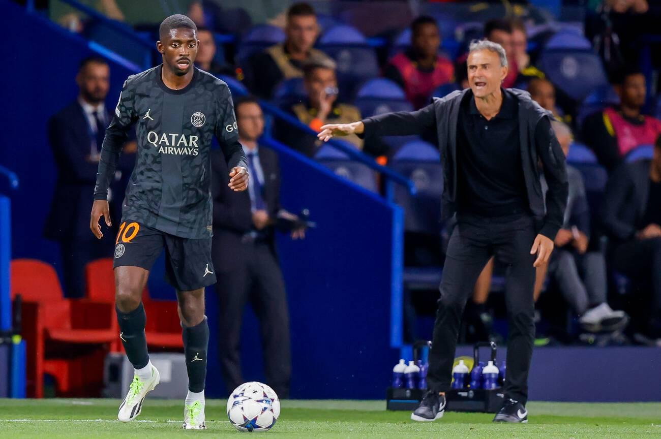 PARIS, FRANCE - SEPTEMBER 19: Ousmane Dembele (Paris Saint-Germain) and Trainer Luis Enrique (Paris Saint-Germain)