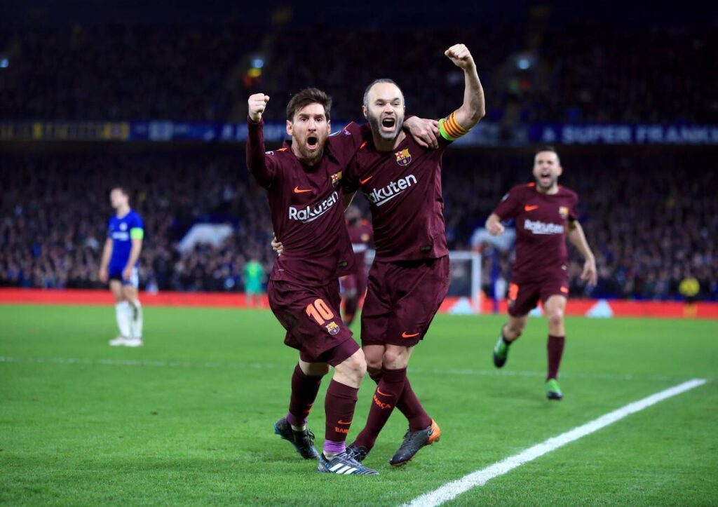 Barcelona's Lionel Messi (left) celebrates scoring his side's first goal of the game with Andres Iniesta during the UEFA Champions League